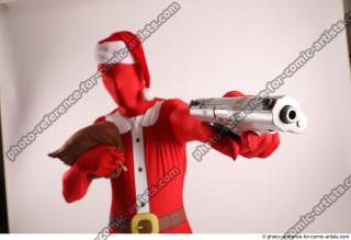 28 2018 01 JOEL ADAMSON CHRISTMAS HERO WITH GUN